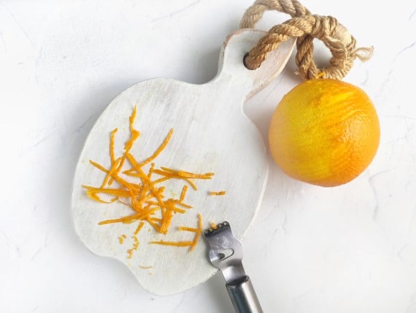 shaved ice recipe - orange zest on cutting board