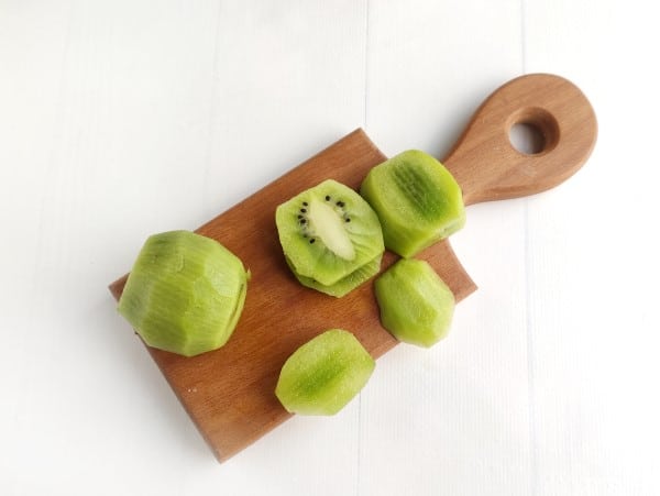 creative sandwich - kiwi on cutting board