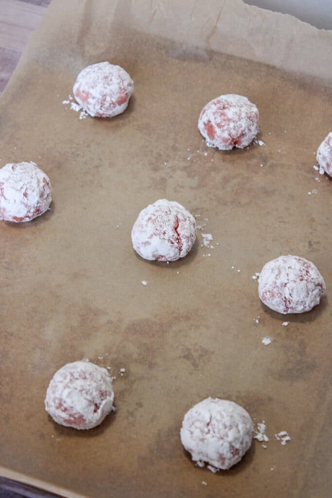 vegan strawberry crinkle cookies - dough on parchment paper