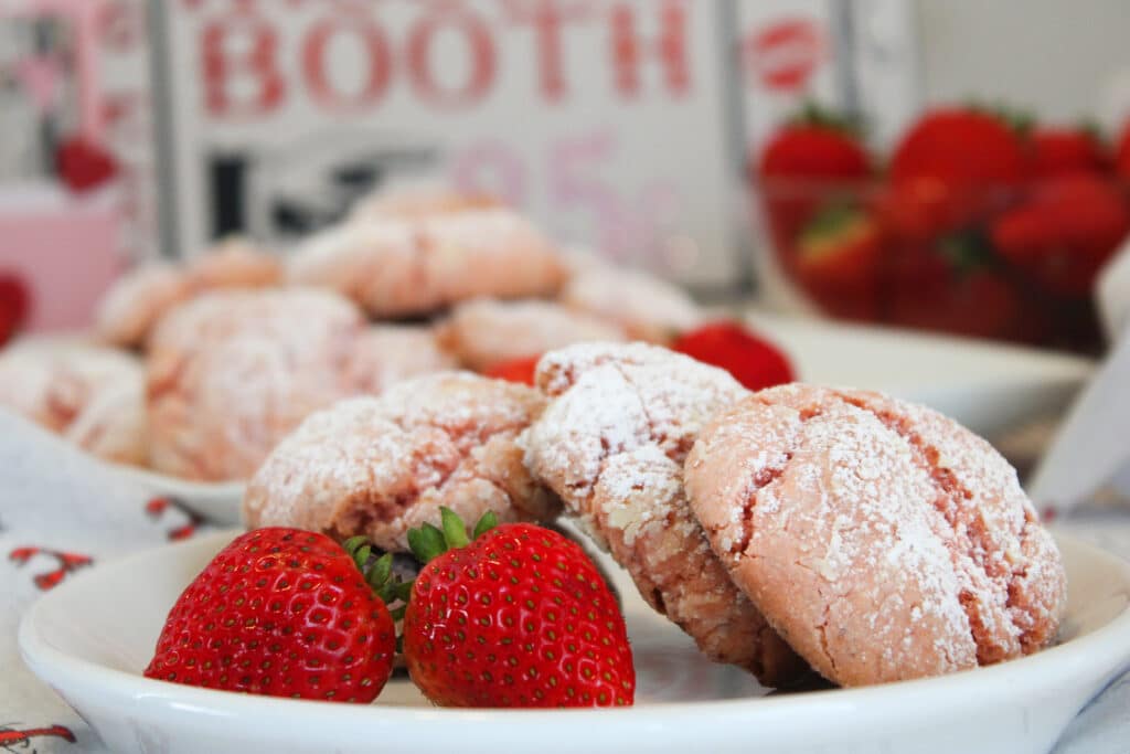 vegan strawberry crinkle cookies with fresh strawberries on the side