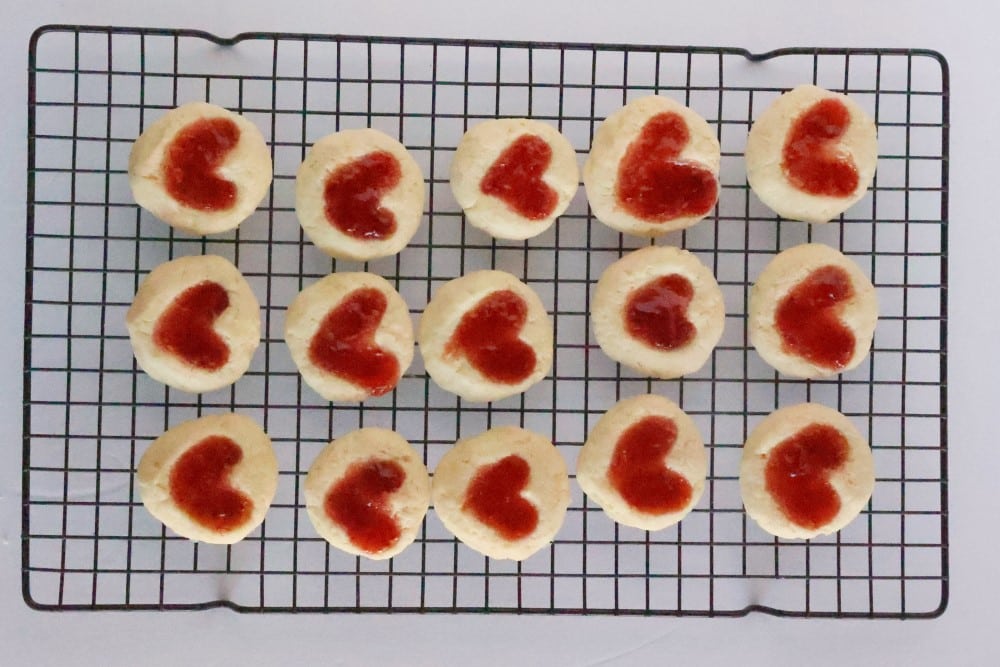 heart thumbprint cookies: on cooling rack