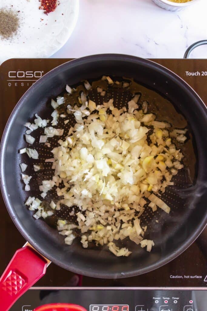 taco recipe - onions in pan