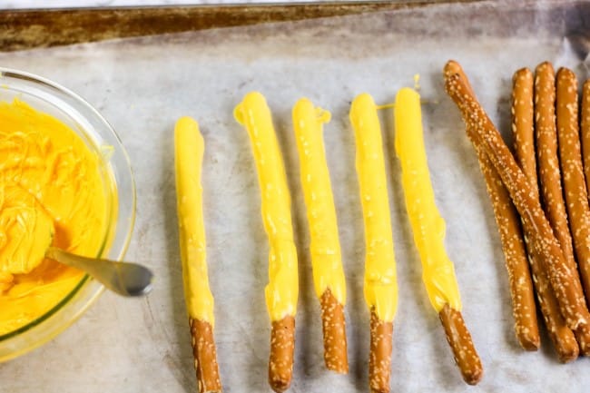 Truffula Trees project - pretzel rods covered in yellow candy coating